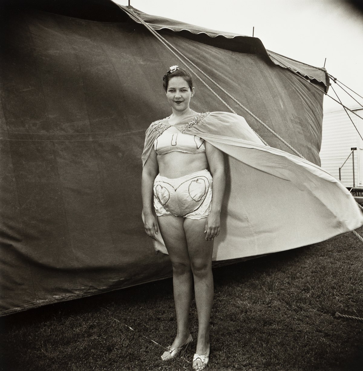 DIANE ARBUS (1923-1971)/NEIL SELKIRK (1947 - ) Girl in Her Circus Costume, MD.